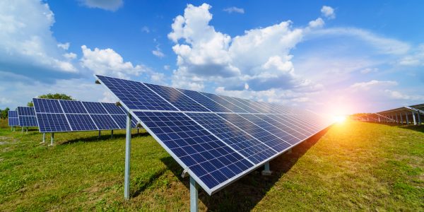 Solar panels on the sky background. Solar power plant. Blue solar panels. Alternative source of electricity. Solar farm.